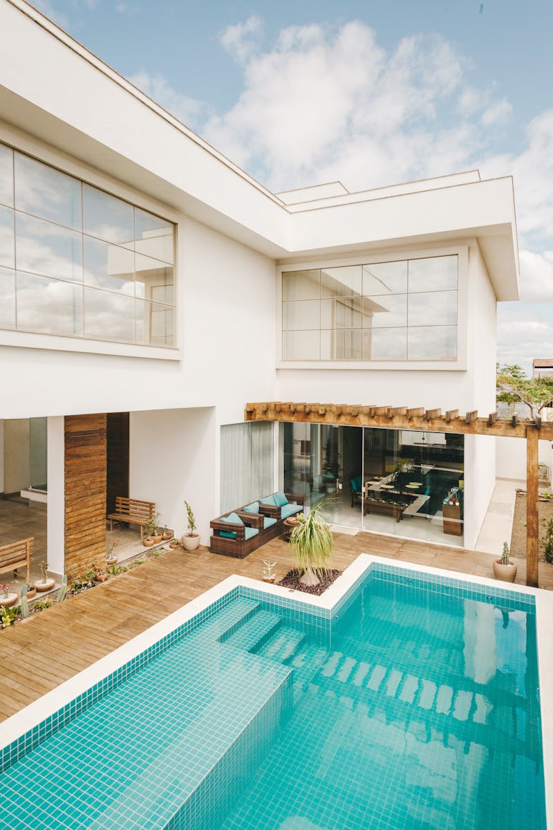 Luxury home with swimming pool and outdoor living spaces